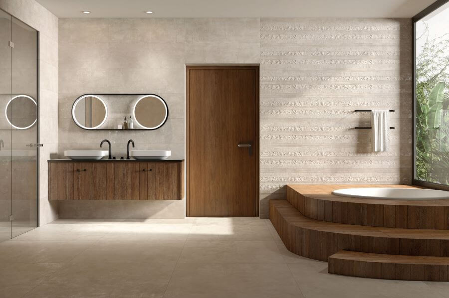 BEAT-BEIGE-CEMENT-LOOK-PORCELAIN-TILE-BATHROOM-SET. Image shows bathroom with wooden bath surround and beige tiles
