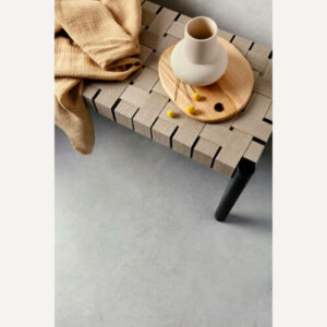 Metro Silver cement-effect porcelain floor tiles in a detailed close-up, showcasing a cool, dove-grey industrial surface with realistic tonal shading and a contemporary, fine-grained matt texture.