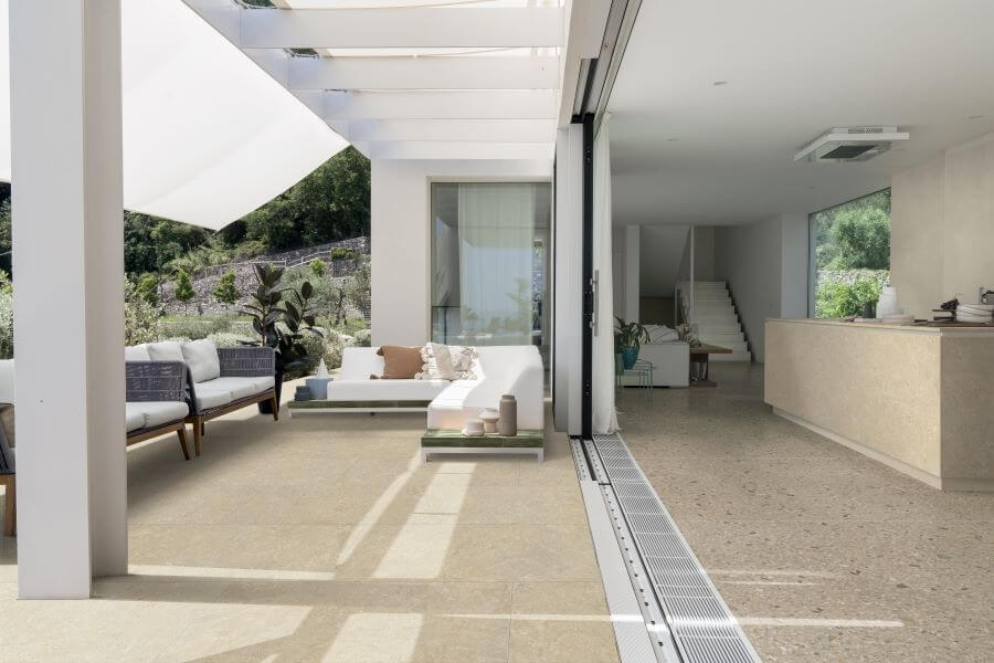 Fusion arena limestone porcelain tiles with warm stone terrazzo