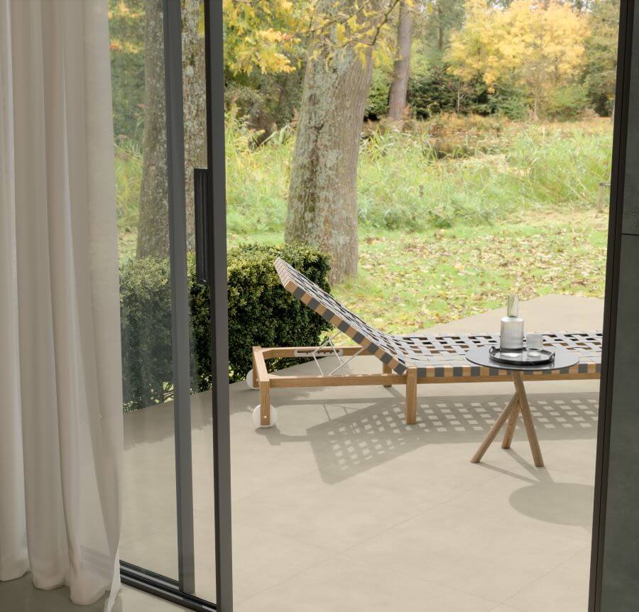 TOAST-BRULEE-CONCRETE-EFFECT-TILES-OUTDOOR Image shows porcelain large outdoor tiles on patio