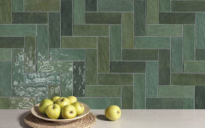 Green Adore Bottle ceramic Spanish tiles displayed in a kitchen with apples.