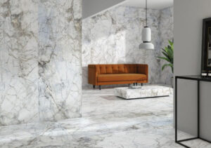 BELLEZA-WHITE-MARBLE-EFFECT-TILE-LOUNGE. Image shows white marble effect tile in lounge