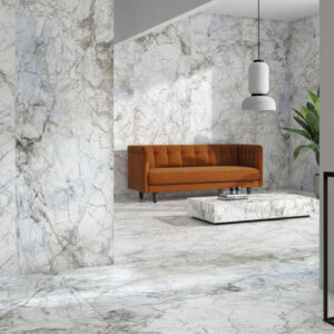 BELLEZA-WHITE-MARBLE-EFFECT-TILE-LOUNGE. Image shows white marble effect tile in lounge