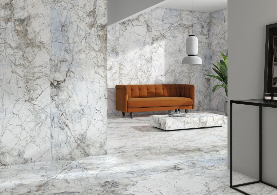 BELLEZA-WHITE-MARBLE-EFFECT-TILE-LOUNGE. Image shows white marble effect tile in lounge