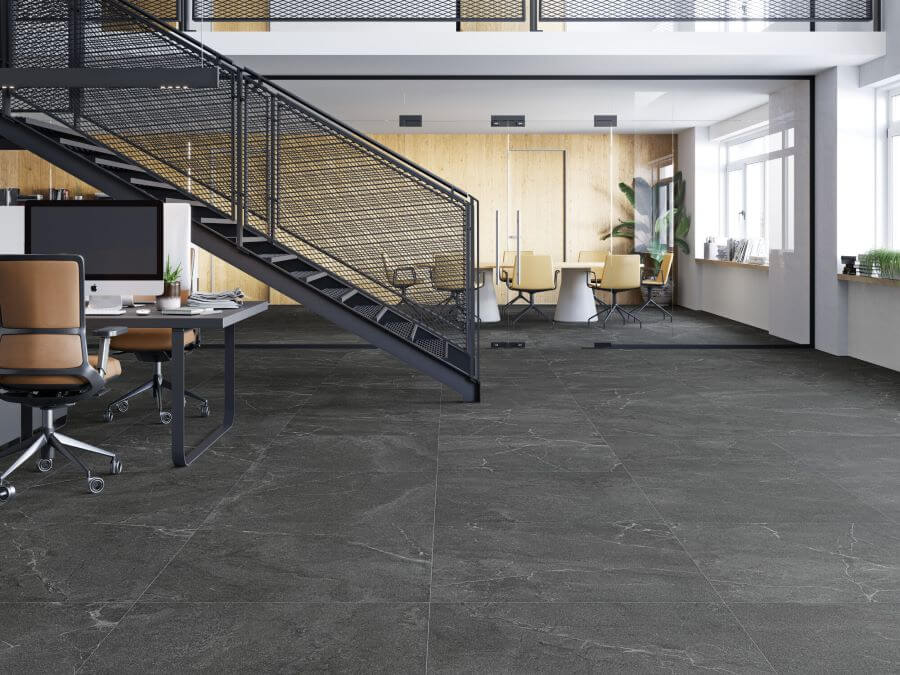 BLISS-CHARCOAL-PORCELAIN-LARGE-STONE-TILES. Image shows charcoal porcelain large stone tiles in office setting