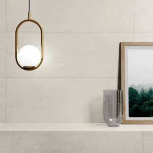 DOCKLANDS-GREY-CEMENT-CERAMIC-TILE. Image shows grey cement ceramic tile on bathroom wall with a glass and picture of trees