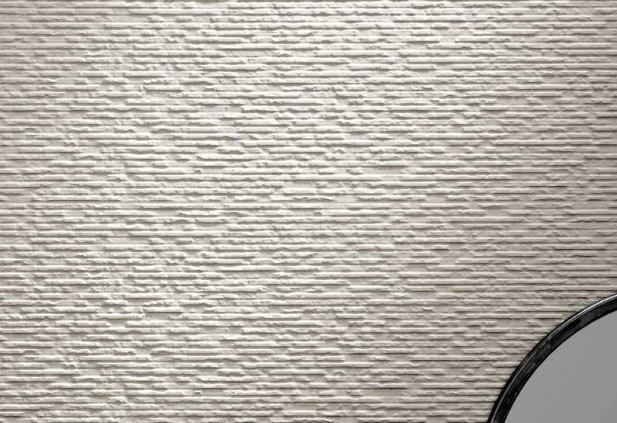 DOCKLANDS-WHITE-CEMENT-CERAMIC-TILE-THREAD. Image shows white cement ceramic tiles on wall with mirror