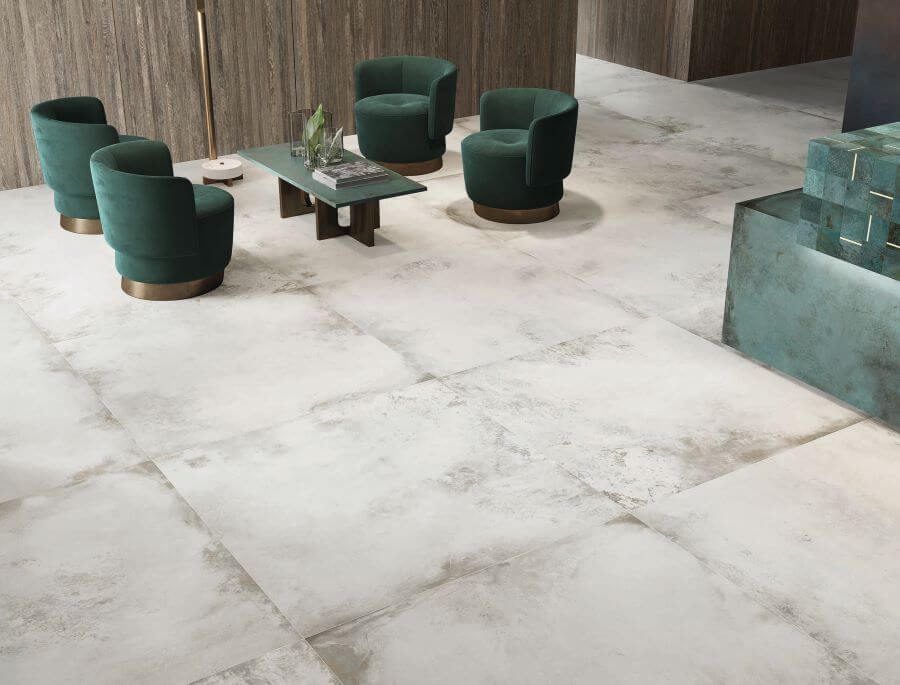 FORGE-PLATINUM-PORCELAIN-METALLIC-TILES. Image shows white porcelain metallic tiles in a restaurant lobby