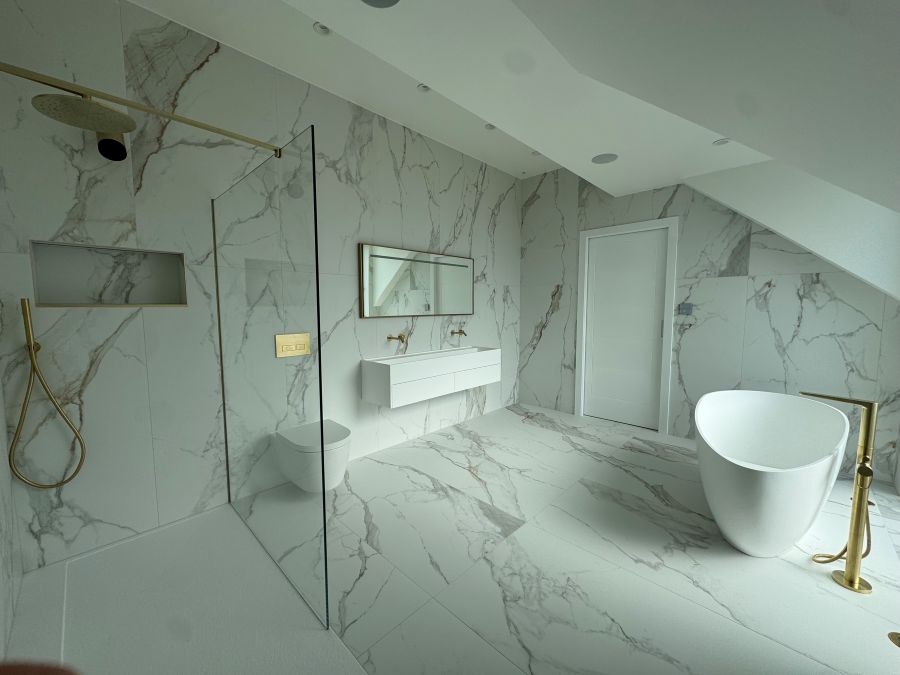 MACCHA-VECCHIA-MARBLE-EFFECT-PORCELAIN-TILE-6 Image shows marble tile to wall and floor with bath and vanity unit.