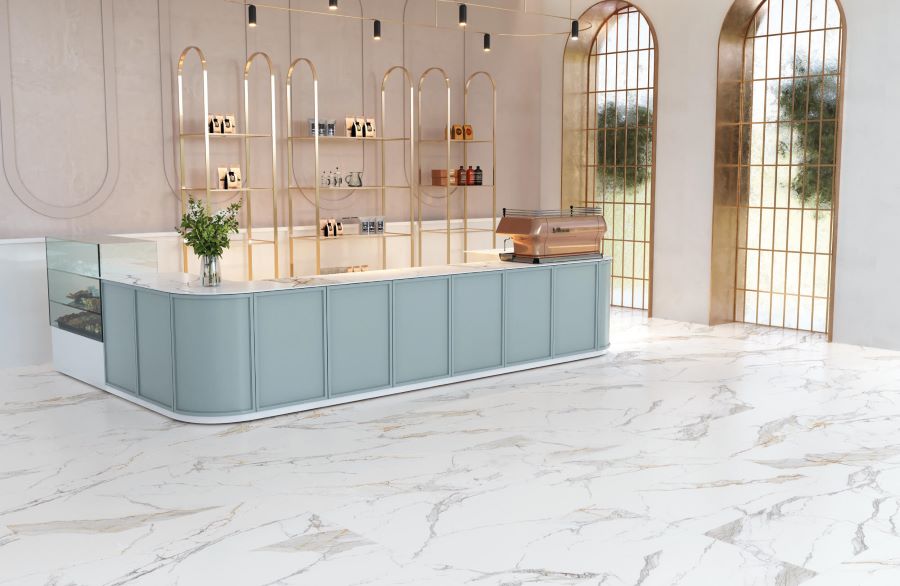 MACCHIA-VECCHIA-MARBLE-EFFECT-PORCELAIN-TILE-CAFE. Image shows macchia vecchia marble effect porcelain tile in cafe with light blue servery