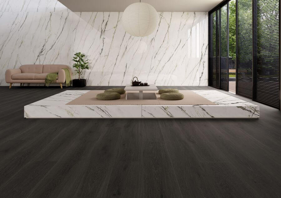 OAK-WOOD-EFFECT-PORCELAIN-FLOOR-TILES-EBONY. Image shows ebony oak wood effect porcelain floor tiles in lounge with matcha green porcelain marble tiles