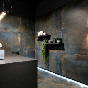 PATINA-BLUE-METALLIC-FINISH-TILES-KITCHEN. Image shows rusty blue black metallic finish tiles in kitchen
