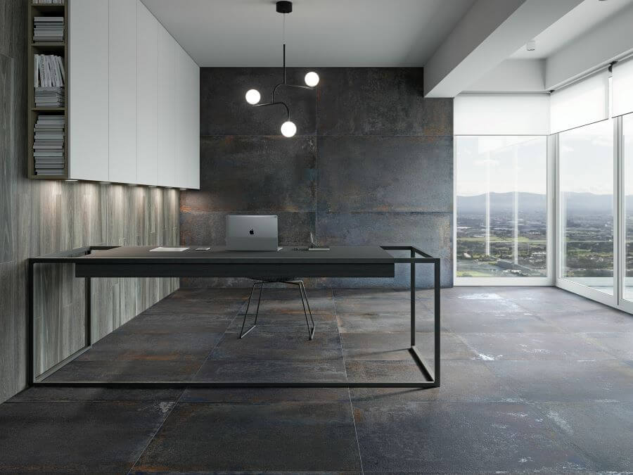 PATINA-BLUE-METALLIC-FINISH-TILES. Image shows rusty blue metallic finish tiles to floor with desk and chair