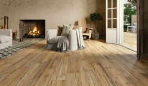 VIBE-RUSTIC-WOOD-EFFECT-TILE-SWATCH. Image shows rustic wood effect tile on floor of lounge