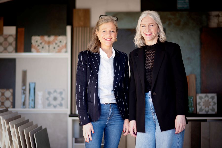 TheTilePortfolio021. Image shows 2 ladies together in tile showroom.