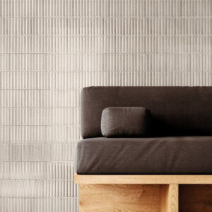 HUSH-CERAMIC-KIT-KAT-WALL-TILE-MOCHA. Image shows mocha kit kat tile on wall with brown sofa in front