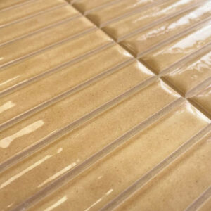 HUSH-CERAMIC-KIT-KAT-WALL-TILE-OCHRE. Image shows close up of yellow kit kat tile