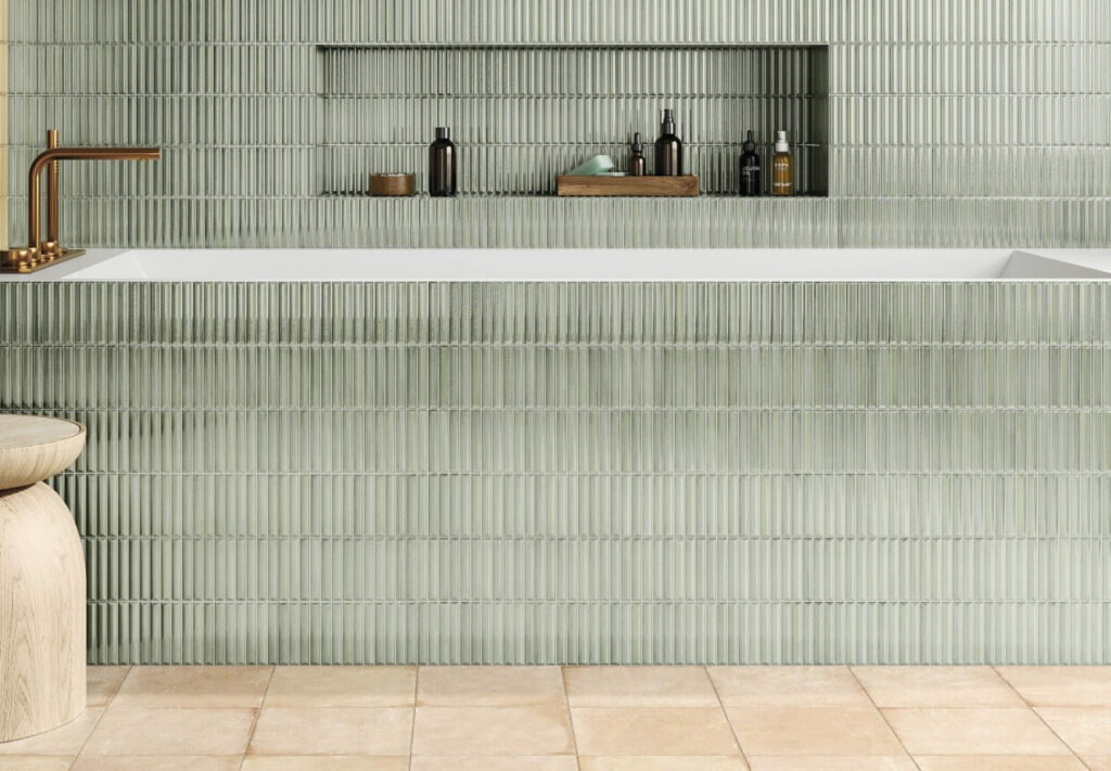 HUSH-CERAMIC-KIT-KAT-WALL-TILE-OLIVE-1. Image shows olive kit kat wall tile in bathroom around bath