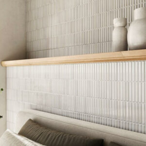 HUSH-CERAMIC-KIT-KAT-WALL-TILE-SAND. Image shows sand colour kit kat wall tile with sofa and vases