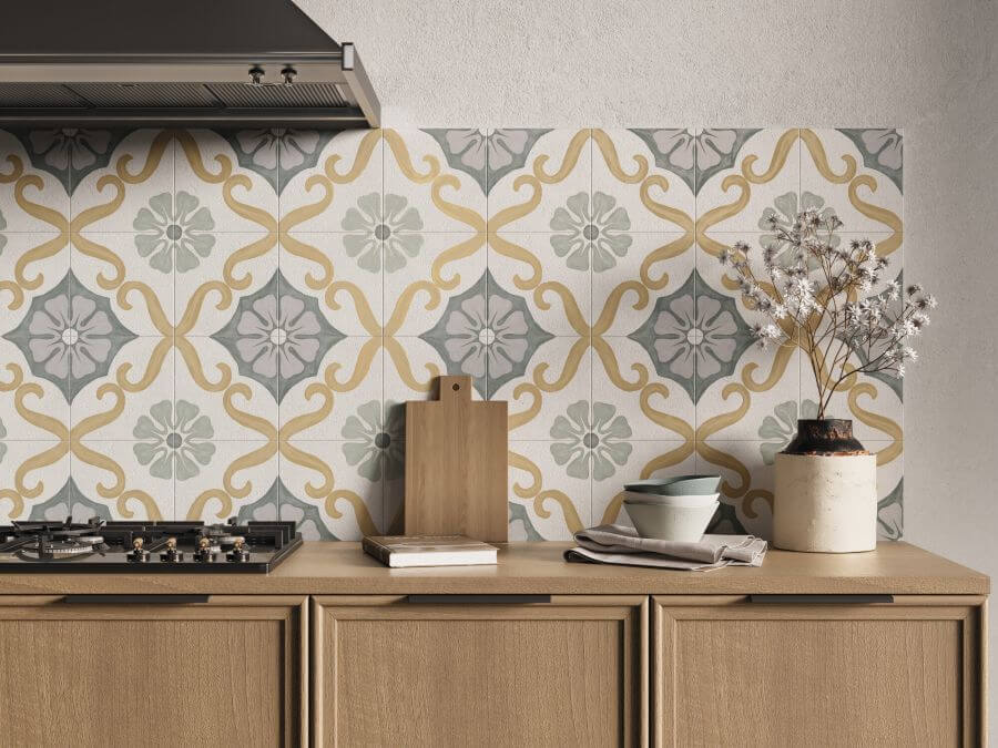 PRETTY-TILES-FOR-KITCHEN-AREAS-FLORAL-SKY. Image shows pretty tiles for kitchen areas with floral pattern as a splashback with chopping board and bowls nesting on worksurface