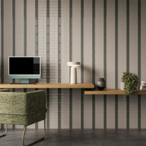 ARC-PORCELAIN-WALL-FEATURE-TILES-DOVE. Image shows porcelain wall feature tiles in grey with taupe tiles and a computer screen