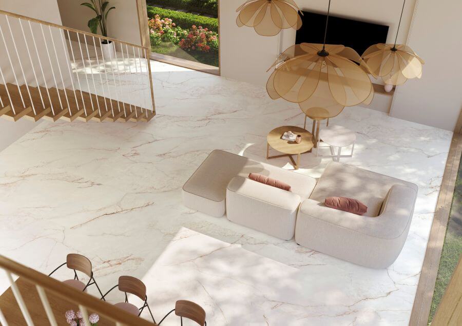 BLUSH-STONE-EFFECT-FLOORING-PINK. Image shows stone effect flooring in pink with light cream sofa and pink cushions