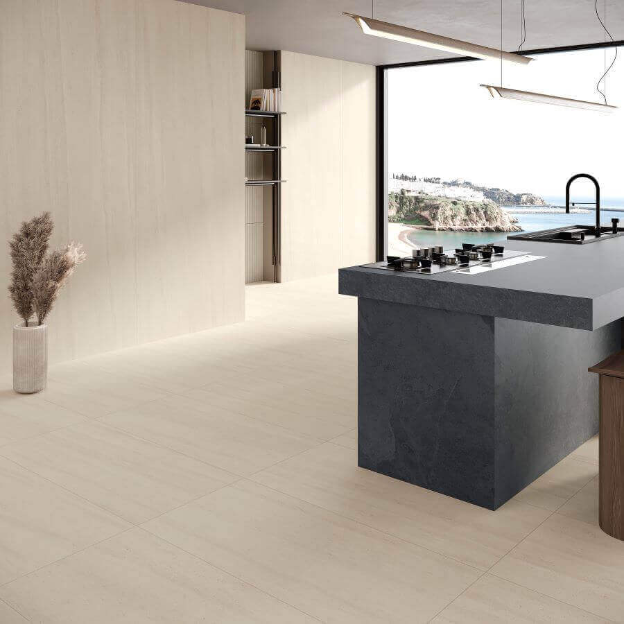 Ethos sand stone effect porcelain floor tiles in kitchen with a view.