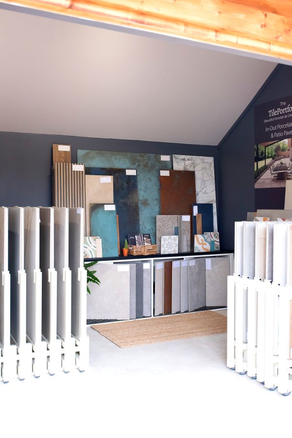 Showroom 1. Image shows backdrop to tile showroom with tile stands