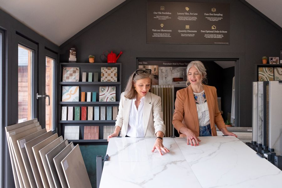 Showroom 10. Image shows 2 ladies looking at porcelain tiles