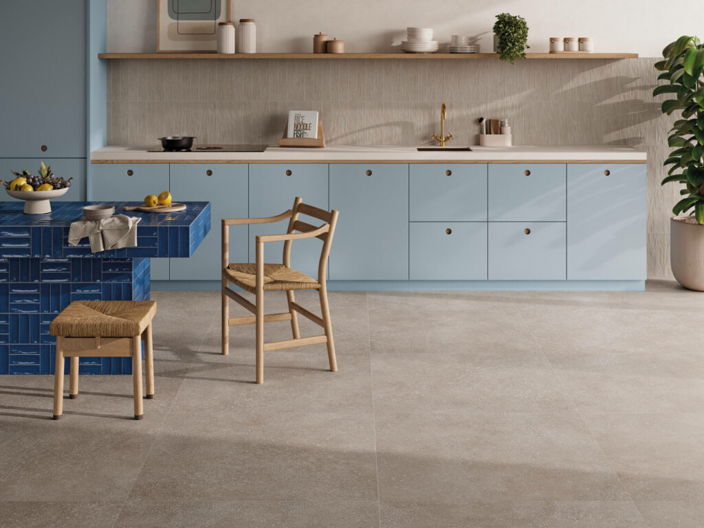 Modern kitchen featuring Spark stone-look porcelain floor tiles in taupe colour.