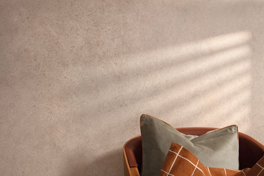 Contemporary room featuring Chic Taupe porcelain tiles with a soft limestone effect, creating a warm, atmosphere.