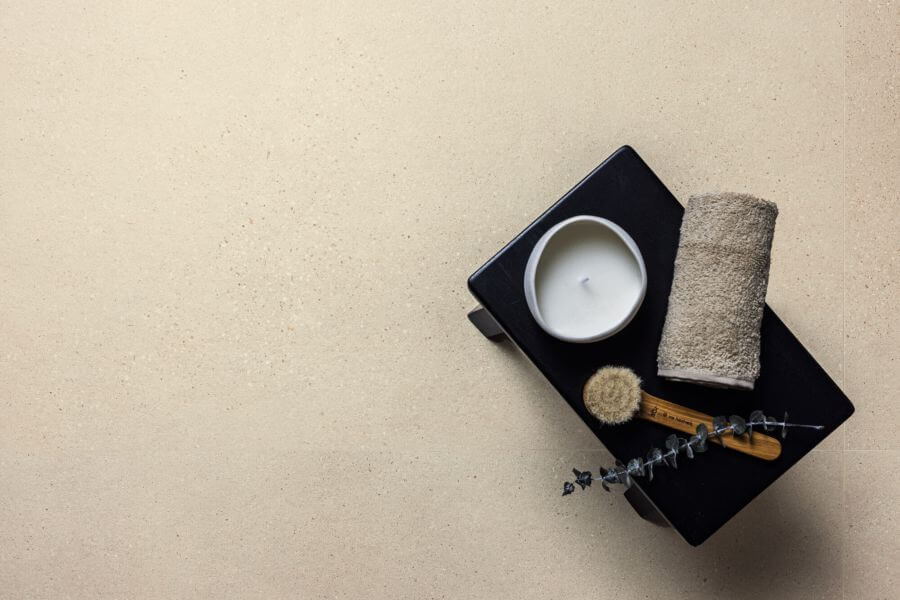 Speckle Oatmeal porcelain tiles with a subtle flecked pattern, creating a soft and textured neutral look.