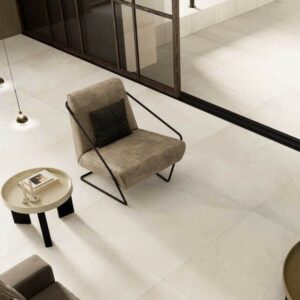 Ethos Shore stone look porcelain floor tiles installed in a contemporary open-plan living space
